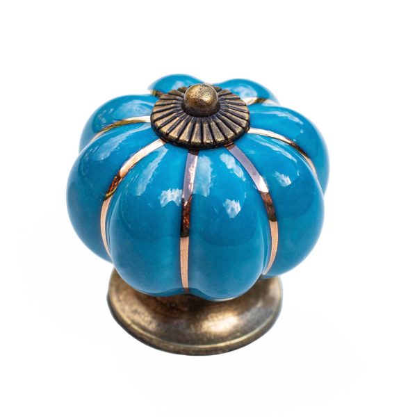 Buton ceramic albastru cu baza bronz, design vintage, ideal pentru mobilier clasic si rustic.