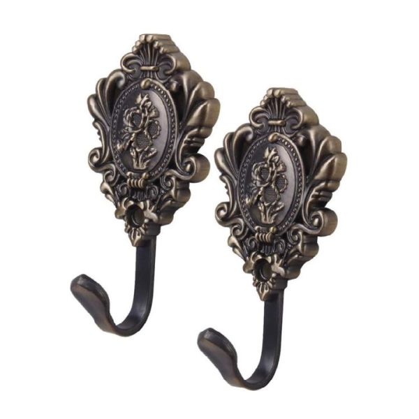 Set cârlige cuier vintage din metal, cu design clasic, ideal pentru holuri, mobilier retro și organizare elegantă.