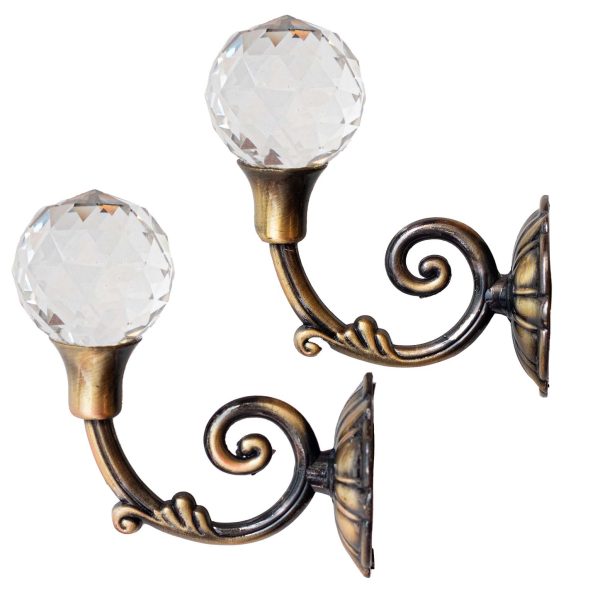 Carlig draperie perdea cu cristal bronz, ideal pentru sustinerea eleganta a perdelelor si draperiilor.